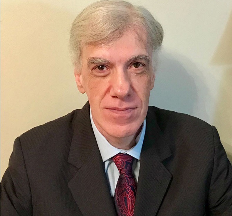 Dr. Claudio Corradino